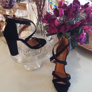 X2B black open toe, criss-cross high heels.